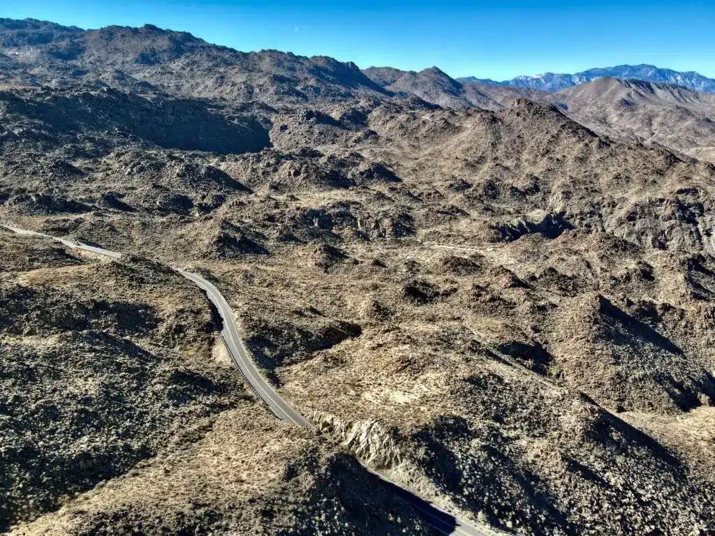 Rancho Mirage Guide 7 Desert landscape with mountains and winding road