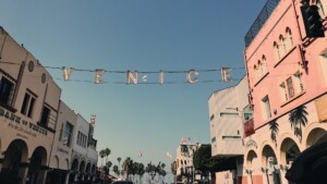 Street scene in Venice with a sign that reads VENICE