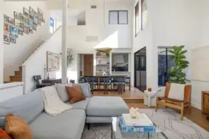 Living room showcasing modern design and comfort, part of a vacation rental by Open Air Homes.