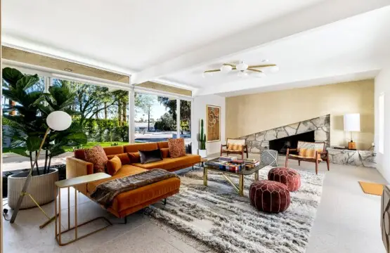 Stylish living room at Monterey Manor in Palm Springs, featuring modern design and large windows.