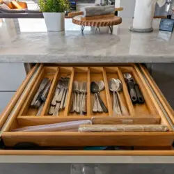 Kitchen drawer with utensils at Skyline View Loft with Chef's Kitchen: DTLA - by Open Air Homes.