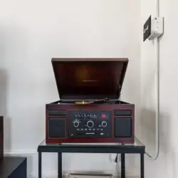 Record player at Skyline View Loft with Chef's Kitchen: DTLA - by Open Air Homes.