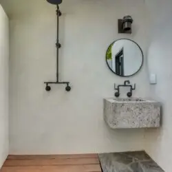 Outdoor shower area at Laurel Canyon Classic Hollywood Residence W/ Pool by Open Air Homes.