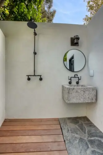 Outdoor shower area at Laurel Canyon Classic Hollywood Residence W/ Pool by Open Air Homes.