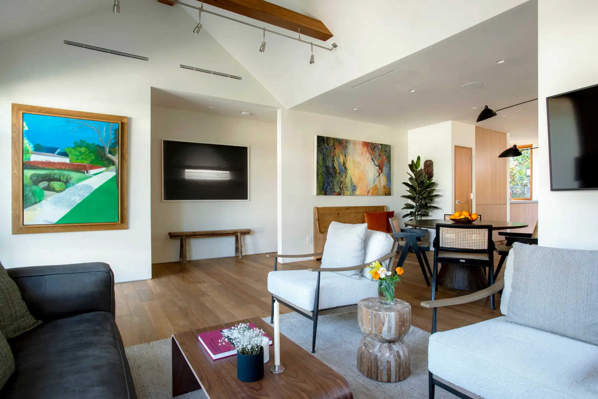 Westwood Airbnb Management - Modern living room with stylish furniture, artwork, and large television - Open Air Homes