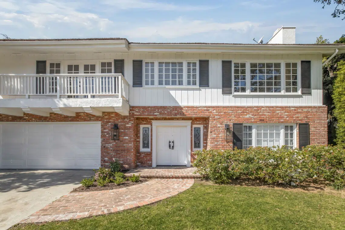 Monthly Rental in Pacific Palisades - Exterior view of Pacific Palisades monthly rental with brick and white facade.
