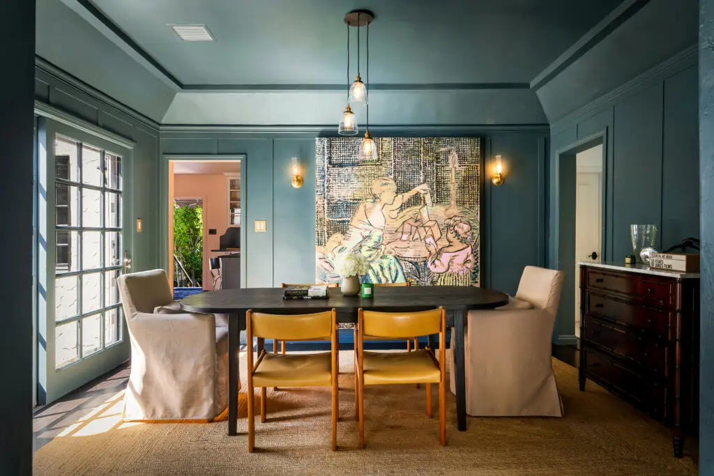 Los Angeles Airbnb Occupancy Rate: How We Book 76% of Nights 19 Los Angeles Airbnb Occupancy Rate - Modern dining room with large artwork in a Venice Beach rental.