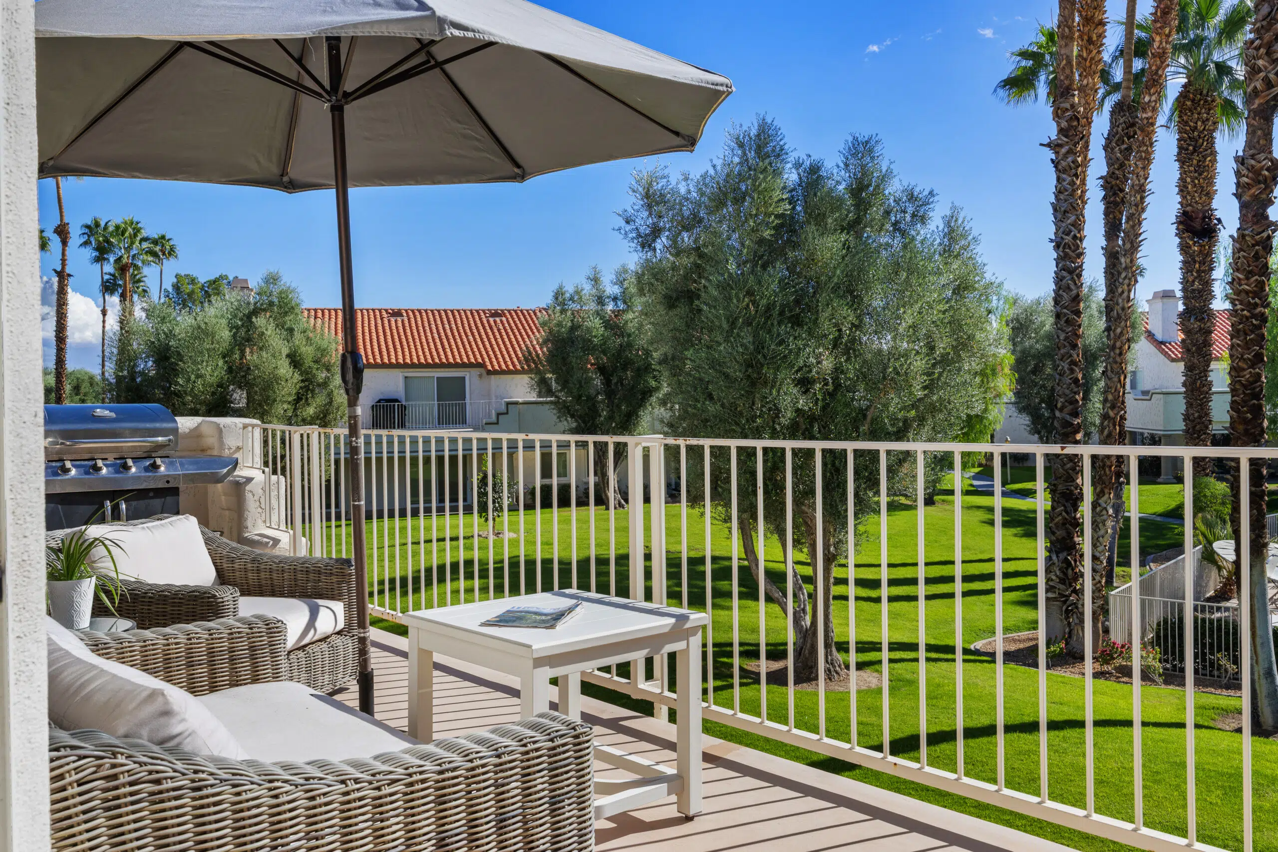 Desert Falls patio with new wicker furniture and grill
