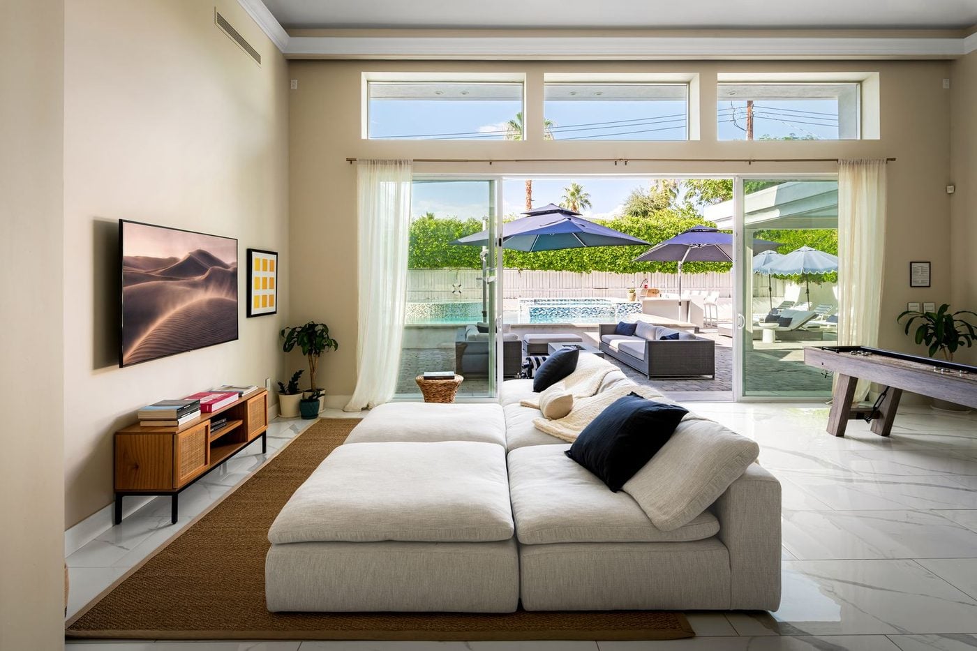 Palm Springs vacation rental living room opening onto the pool after the renovation